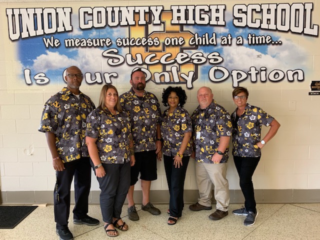 Union County High School teachers in their custom Hawaiian shirts