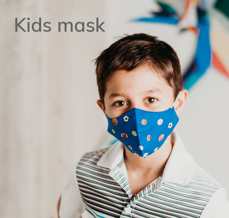 child wearing a kid's size blue sports themed cotton face mask