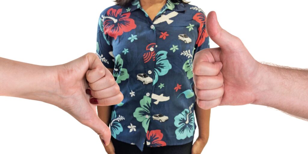 Photo of model (body only) wearing custom print Hawaiian shirt with hands giving thumbs up/thumbs down to the side