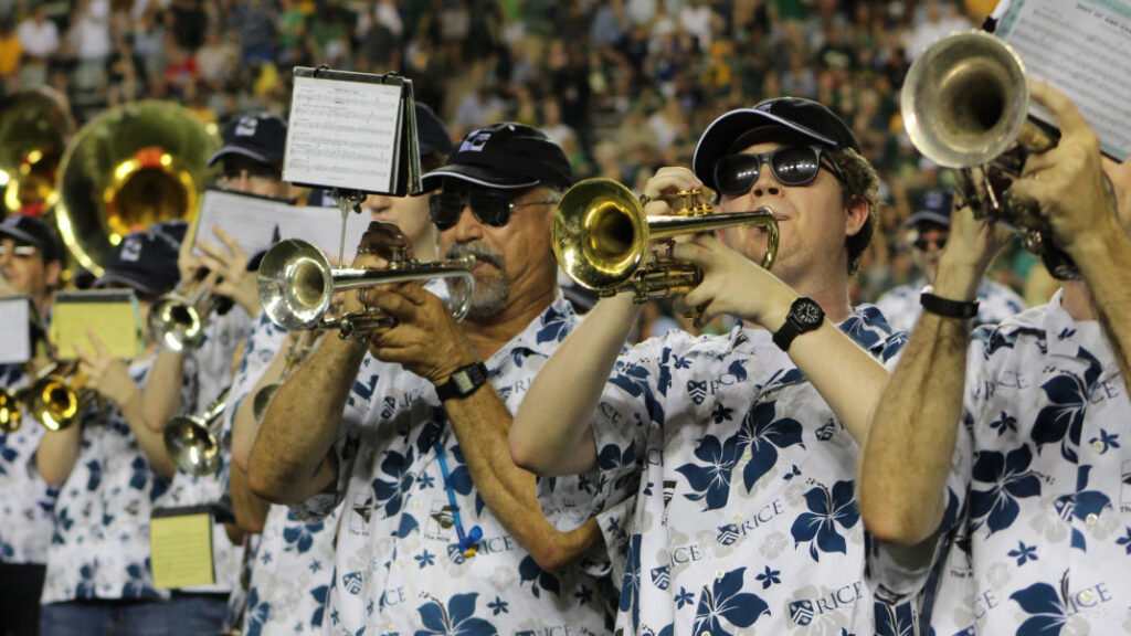 Photo of Rice University marching band wearing custom printed Hawaiian shirts