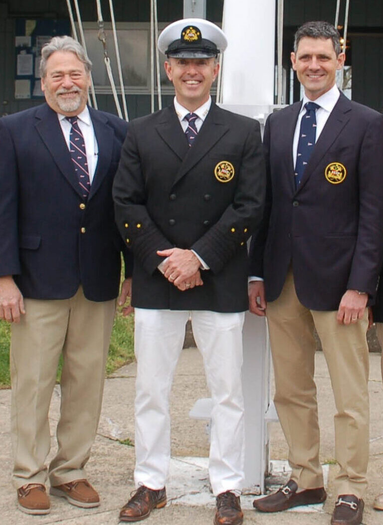 Photo of three men wearing yacht club flag custom ties