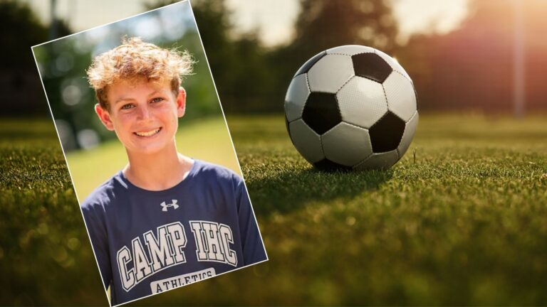 A photo of Blake to the left in the foreground. In the background, a photo of a soccer ball on a grassy field.