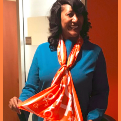 YWCA Chicago CEO Dorri McWhorter showing off her YWCA scarf! Read more at the YWCA Metropolitan Chicago customer spotlight YWCA Chicago CEO Dorri McWhorter showing off her orange YWCA scarf!