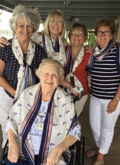 The lovely ladies of the Augusta Yacht Club with their custom scarves. The lovely ladies of the Augusta Yacht Club with their custom scarves.