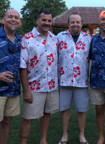 "I just want to let you know how much the team has enjoyed these shirts.
And personally, I appreciate the service you all provided. From quick response times, to the great design options that you allowed us to give input on, and the extra mile you and your team went to make sure we got our shirts before the company trip. I have already given your info to other folks who have asked about the shirts and will continue to do so.
Thank you all for everything!" - Brian Miller, Operations Four Syfan Logistics employees wear custom printed Hawaiian shirts