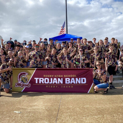 The Rigby High School Band performed on the 80th anniversary of Pearl Harbor this year Group photo of Rigby High School Band with large banner
