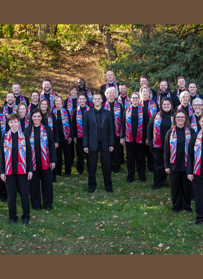 Group photo of Together in Hope Choir wearing custom print scarves