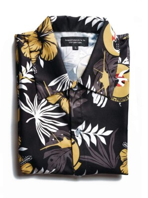 27th Fighting Eagles this is a black custom military hawaiian shirt, with white fronds and gold flowers, airplanes, and a squadron patch
