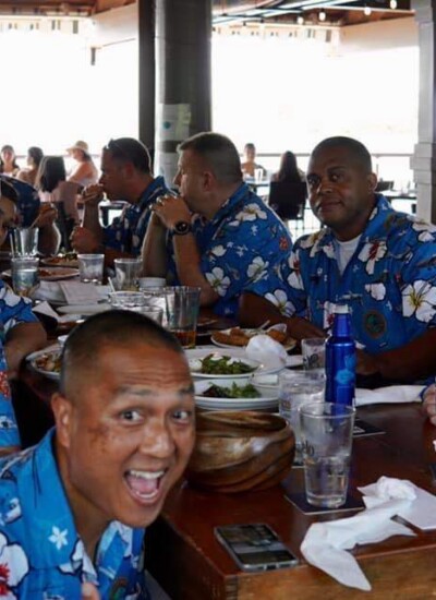 We are very happy with our shirts. Group photo of MARFORPAC Aviation Ohana team at lunch wearing custom printed Hawaiian shirts
