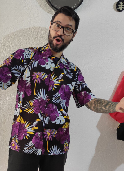 "Our employees have absolutely loved the Hawaiian shirts you designed for us last year - thank you again for your help with that project!" Clevertech employee wearing custom Hawaiian shirt