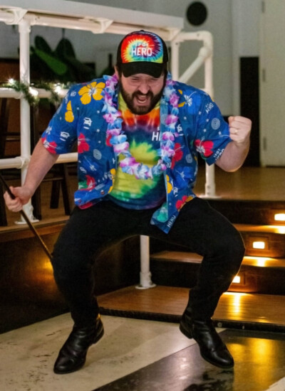"Hi Becky,
I cannot thank you enough for your team helping us get our most loved shirts ever. We have been non-stop busy since the holidays and I wanted to share with you all the amazing pictures we got of our team rocking the hawaiian shirts! Wish you all the best!" Photo of Spot Hero employee wearing custom Hawaiian shirt