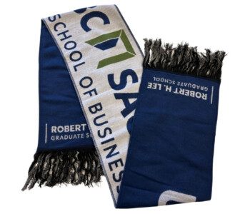 New! Warm and soft poly/viscose blend • 12″ inch wide and up to 70″ long with a short fringe • 200 piece min. order Double sided woven scarf UCSB Robert H. Lee Graduate School