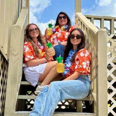 The good news is that our HR department coordinated themed Thursdays in the office this past spring and one of the themes was tropical day. Our marketing department took advantage of this opportunity to wear our shirts! I attached the photo of us so you can use that. 🙂